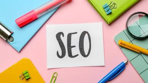 SEO written on a piece of white page.